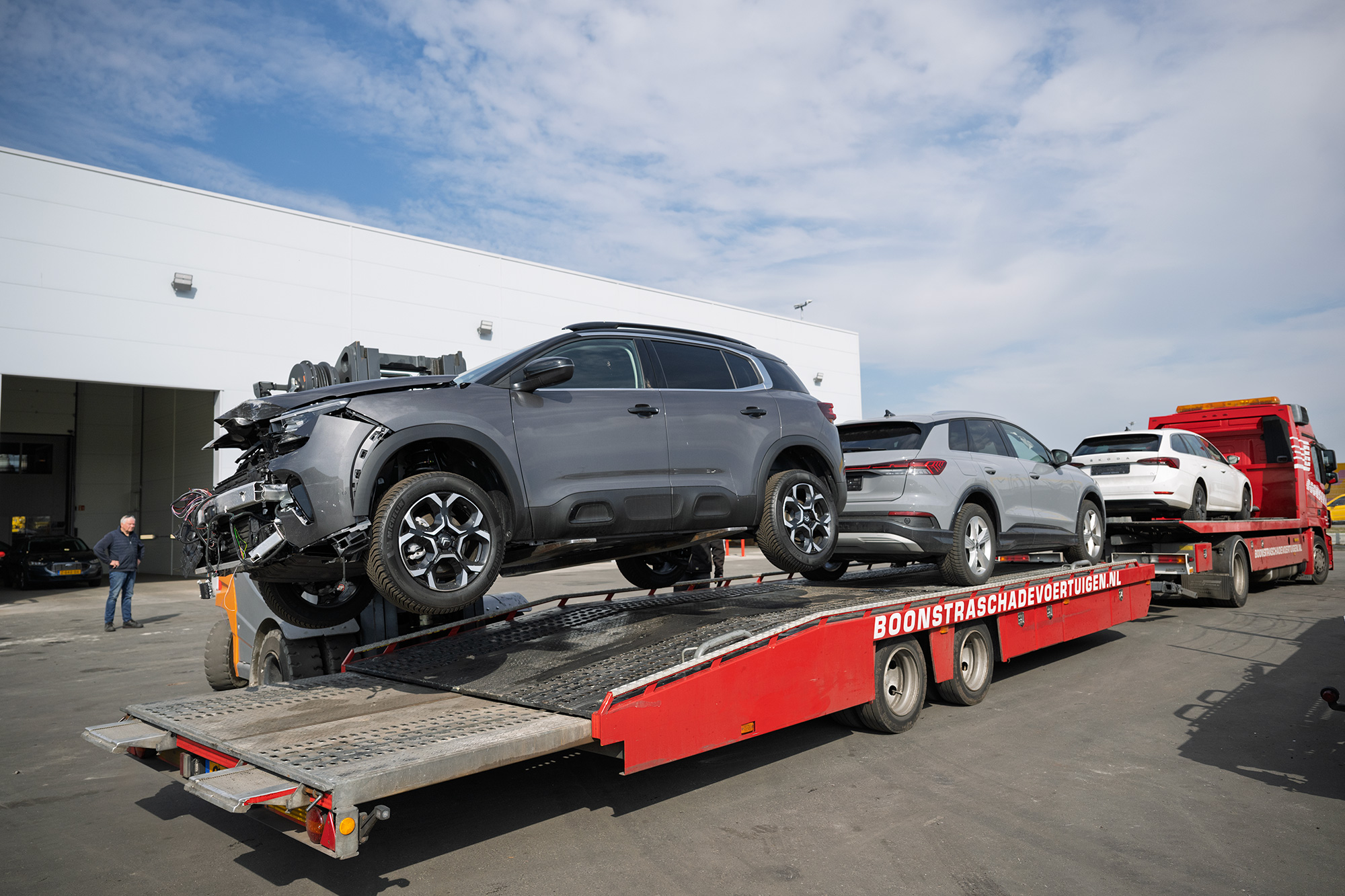 Boonstra-schadevoertuigen-laden-transport